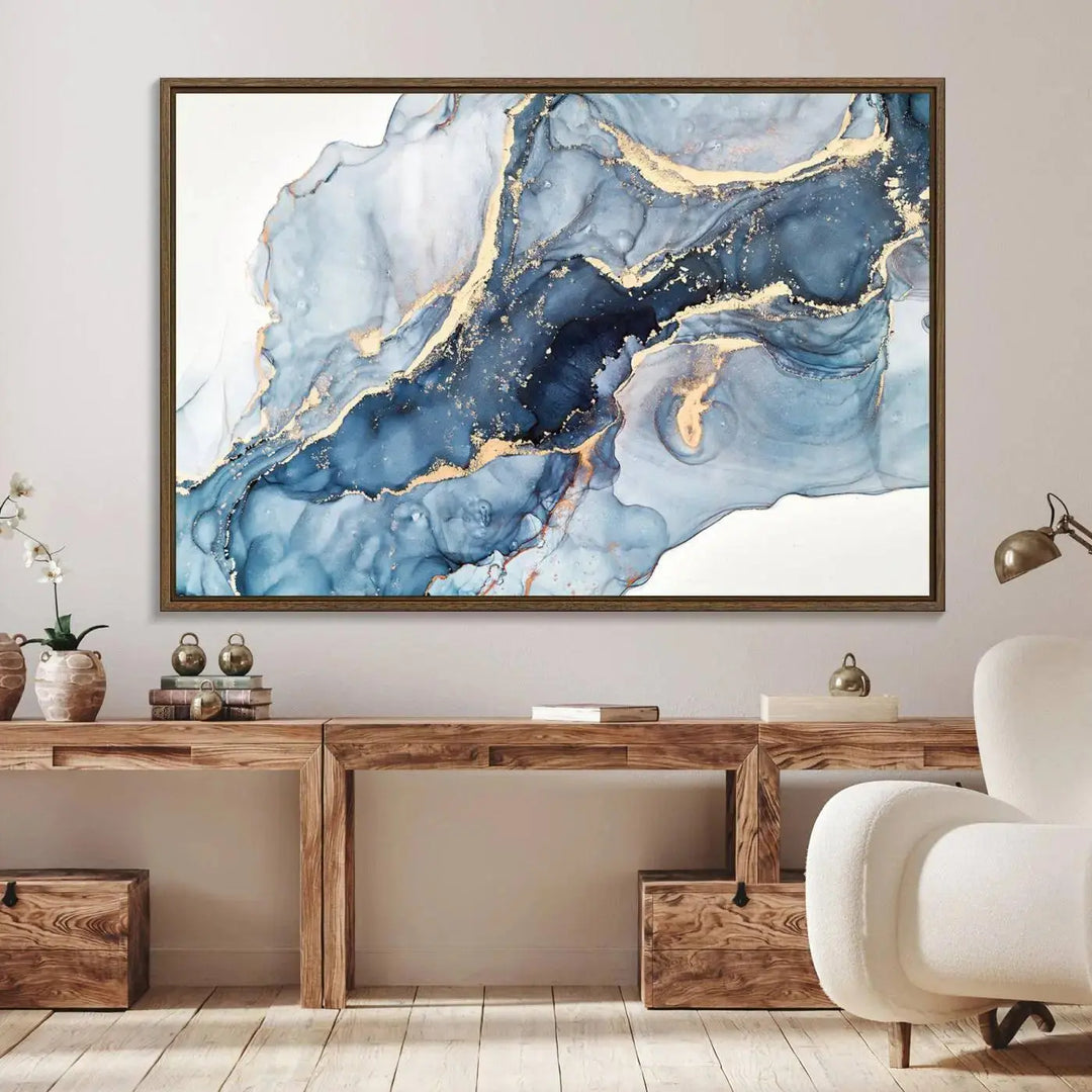 A contemporary setting showcases the "Abstract Art Print - Blue Abstract Canvas Wall Art Print Abstract Art Fluid Effect Marble Wall Art" on a dark wall.