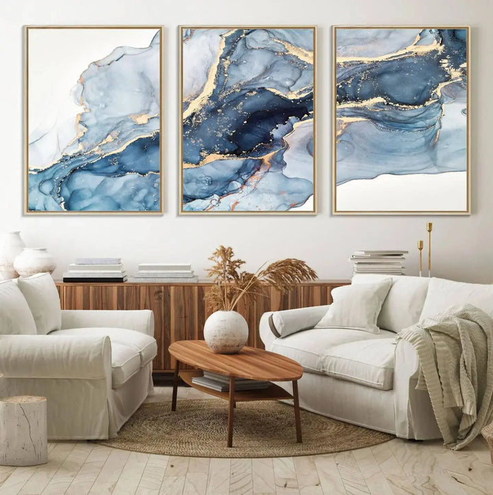 A contemporary setting showcases the "Abstract Art Print - Blue Abstract Canvas Wall Art Print Abstract Art Fluid Effect Marble Wall Art" on a dark wall.