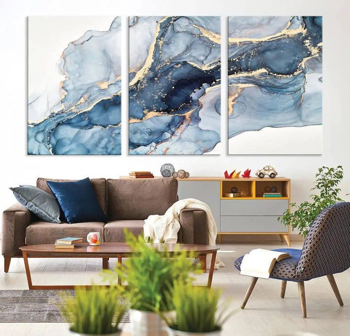 A contemporary setting showcases the "Abstract Art Print - Blue Abstract Canvas Wall Art Print Abstract Art Fluid Effect Marble Wall Art" on a dark wall.