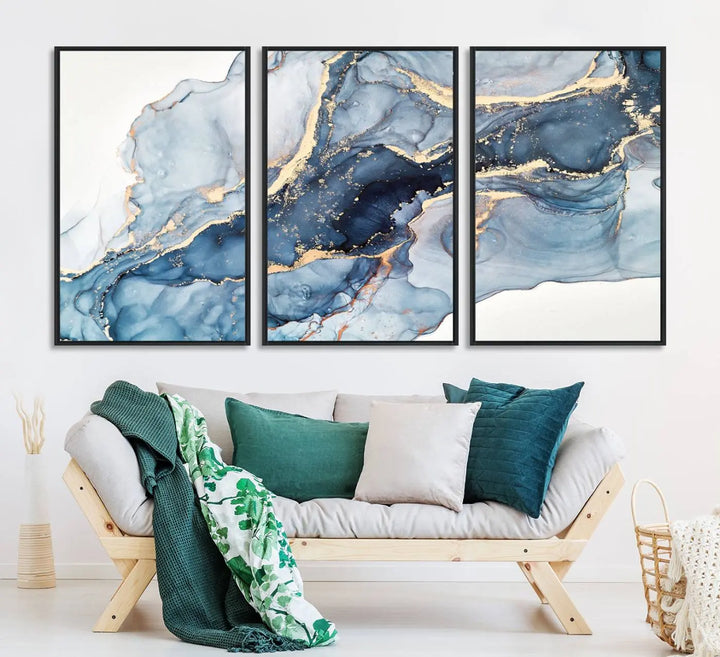 An abstract art print with fluid blue and gold hangs elegantly on the wall.