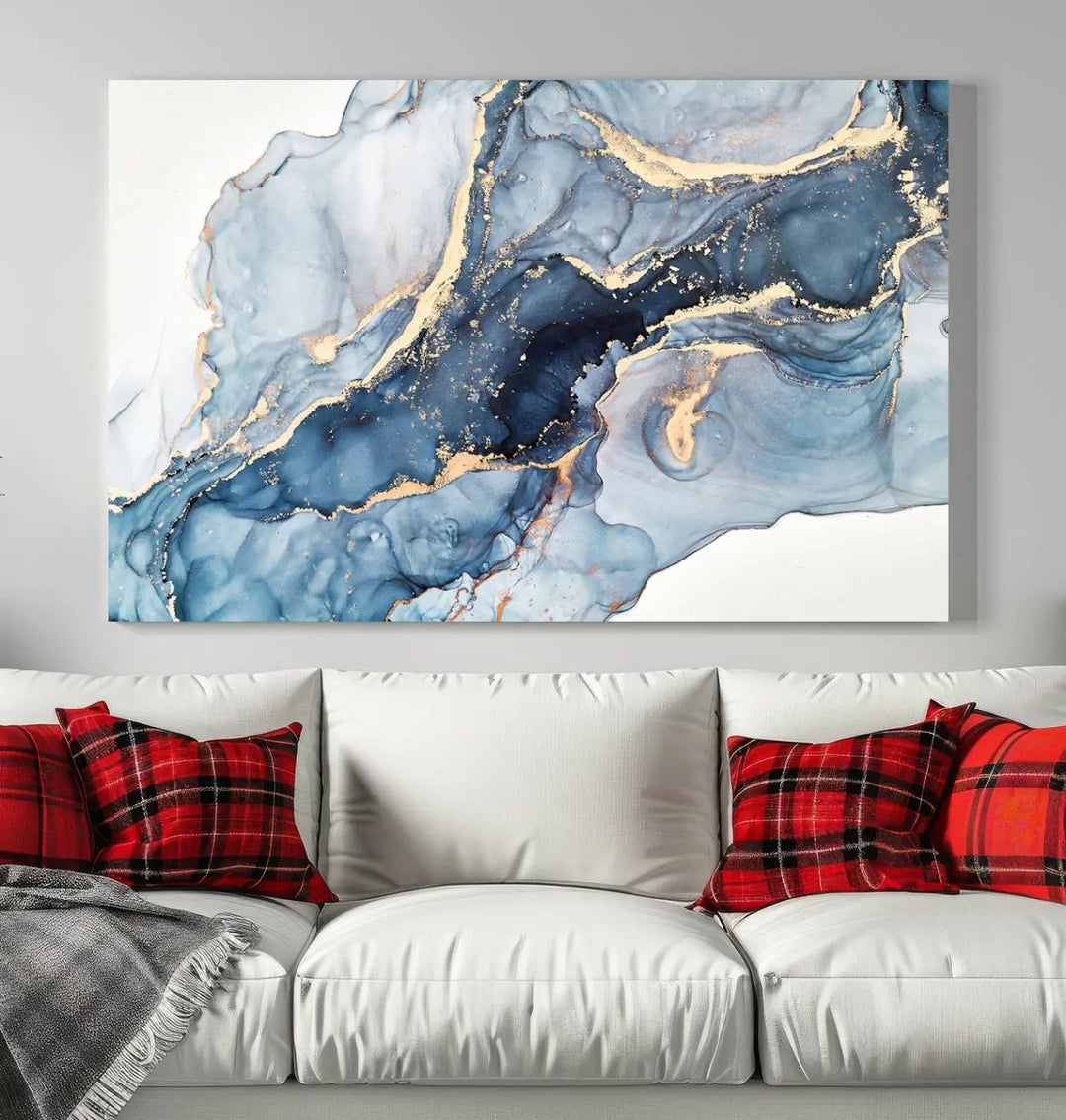 The living room showcases a striking Abstract Art Print - Blue Abstract Canvas Wall Art, featuring fluid effect artwork in vibrant blue and gold tones.