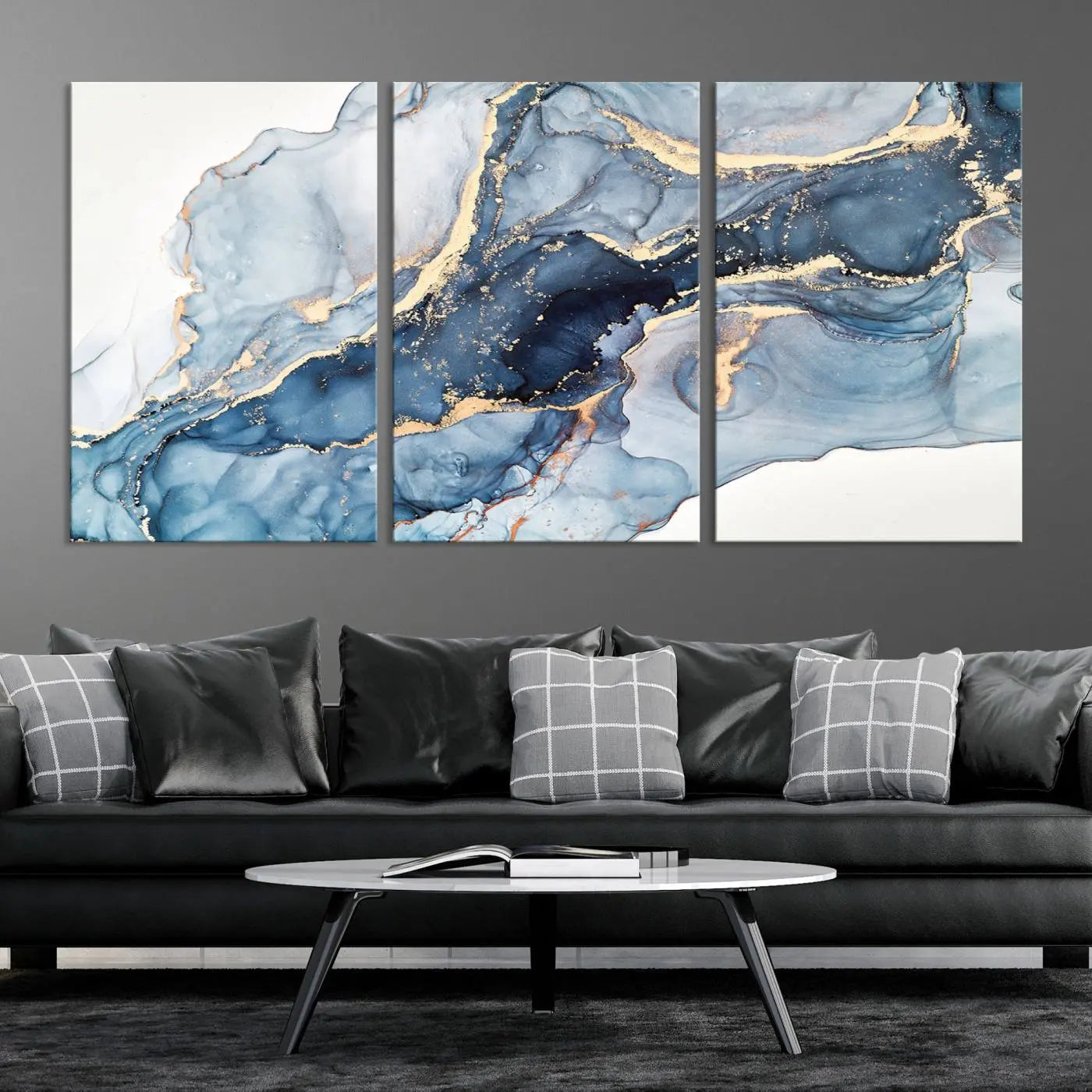 The living room showcases a striking Abstract Art Print - Blue Abstract Canvas Wall Art, featuring fluid effect artwork in vibrant blue and gold tones.