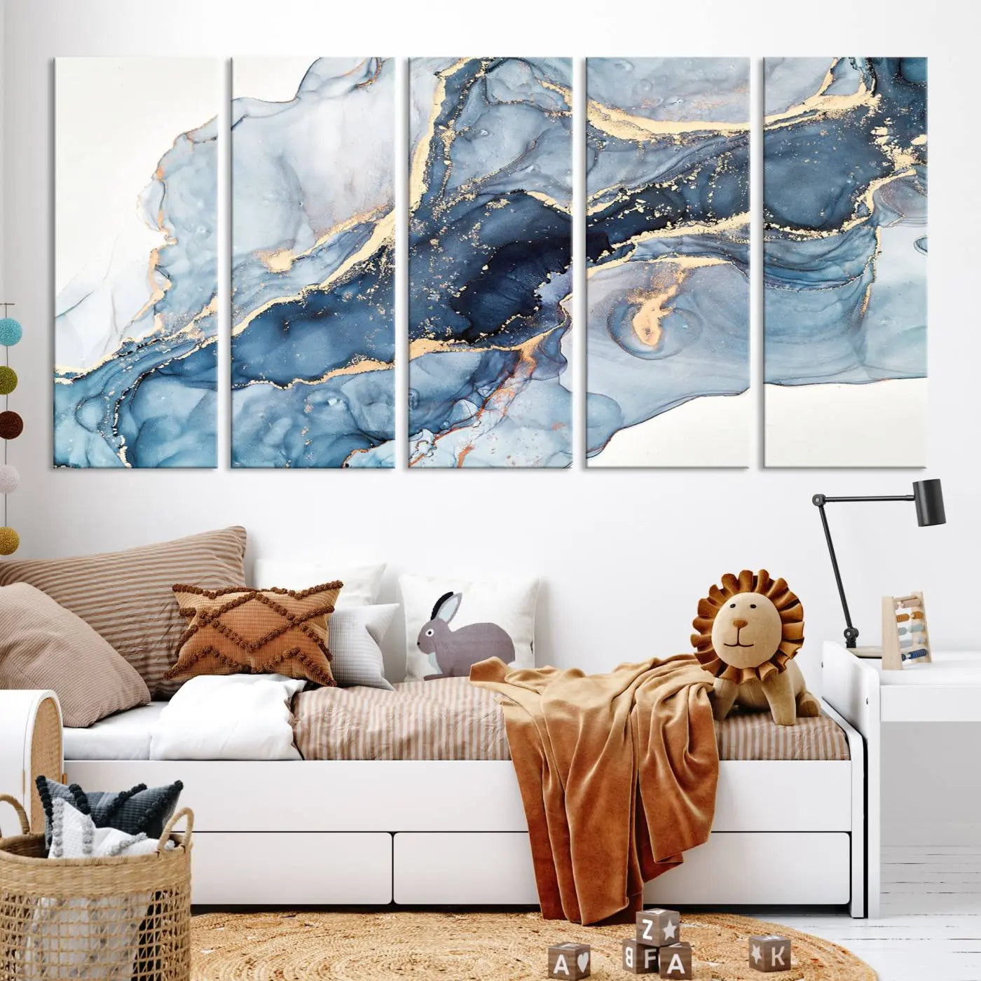 The living room showcases a striking Abstract Art Print - Blue Abstract Canvas Wall Art, featuring fluid effect artwork in vibrant blue and gold tones.