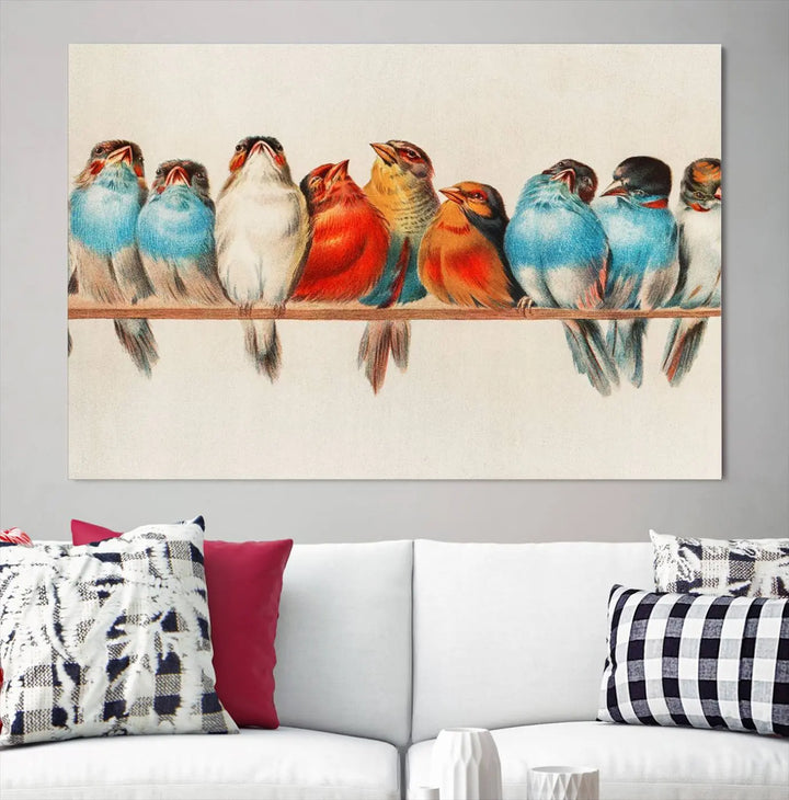 The Abstract Birds Wall Art Canvas Print, featuring a triptych of colorful birds perched on a branch, is printed on museum-quality canvas and equipped with a UV-protective coating and ready-to-hang design. This artwork adds vibrant elegance to your living space.