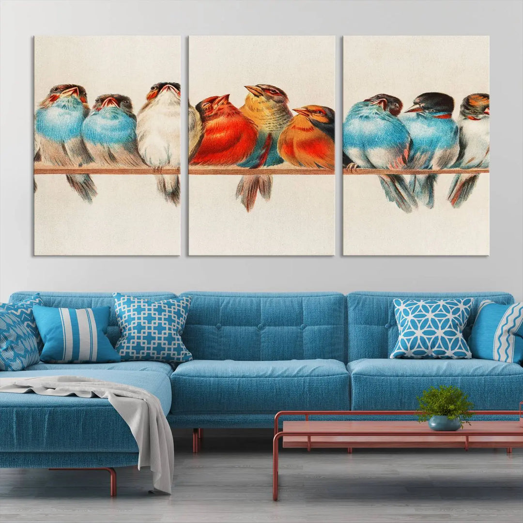 The Abstract Birds Wall Art Canvas Print, featuring a triptych of colorful birds perched on a branch, is printed on museum-quality canvas and equipped with a UV-protective coating and ready-to-hang design. This artwork adds vibrant elegance to your living space.