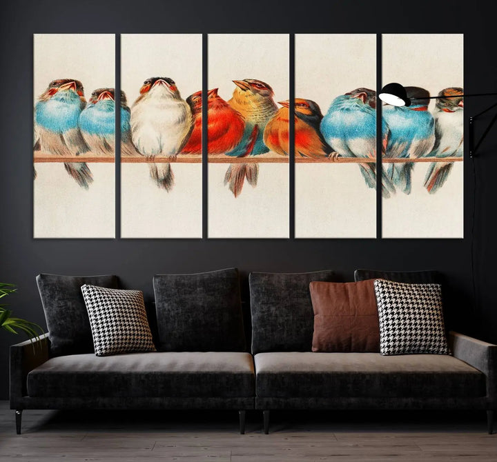 The Abstract Birds Wall Art Canvas Print, featuring a triptych of colorful birds perched on a branch, is printed on museum-quality canvas and equipped with a UV-protective coating and ready-to-hang design. This artwork adds vibrant elegance to your living space.