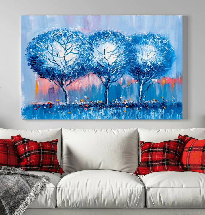 The living room showcases the Abstract Blue Trees Trendy Wall Art Canvas Print, elegantly featuring a triptych of blue trees against a pink background.