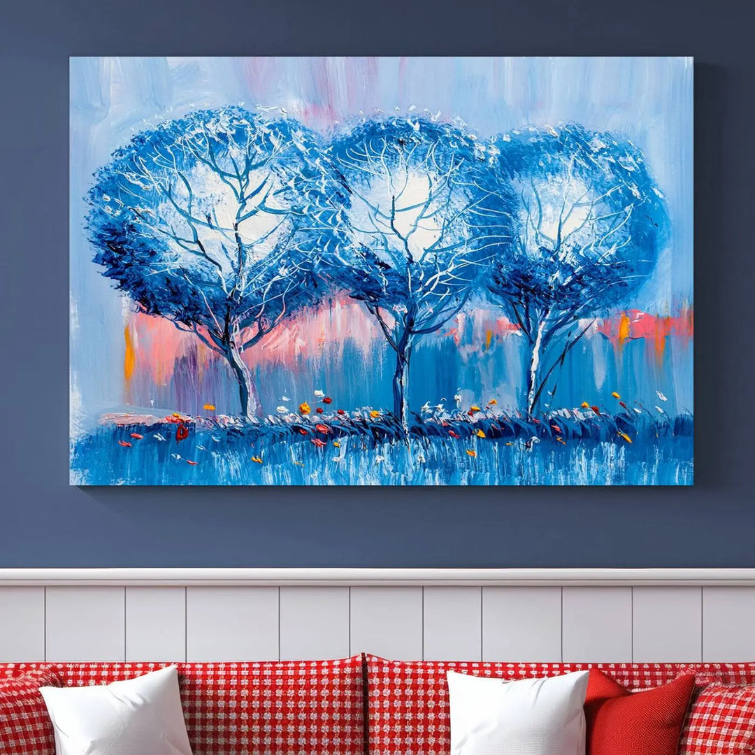 The living room showcases the Abstract Blue Trees Trendy Wall Art Canvas Print, elegantly featuring a triptych of blue trees against a pink background.