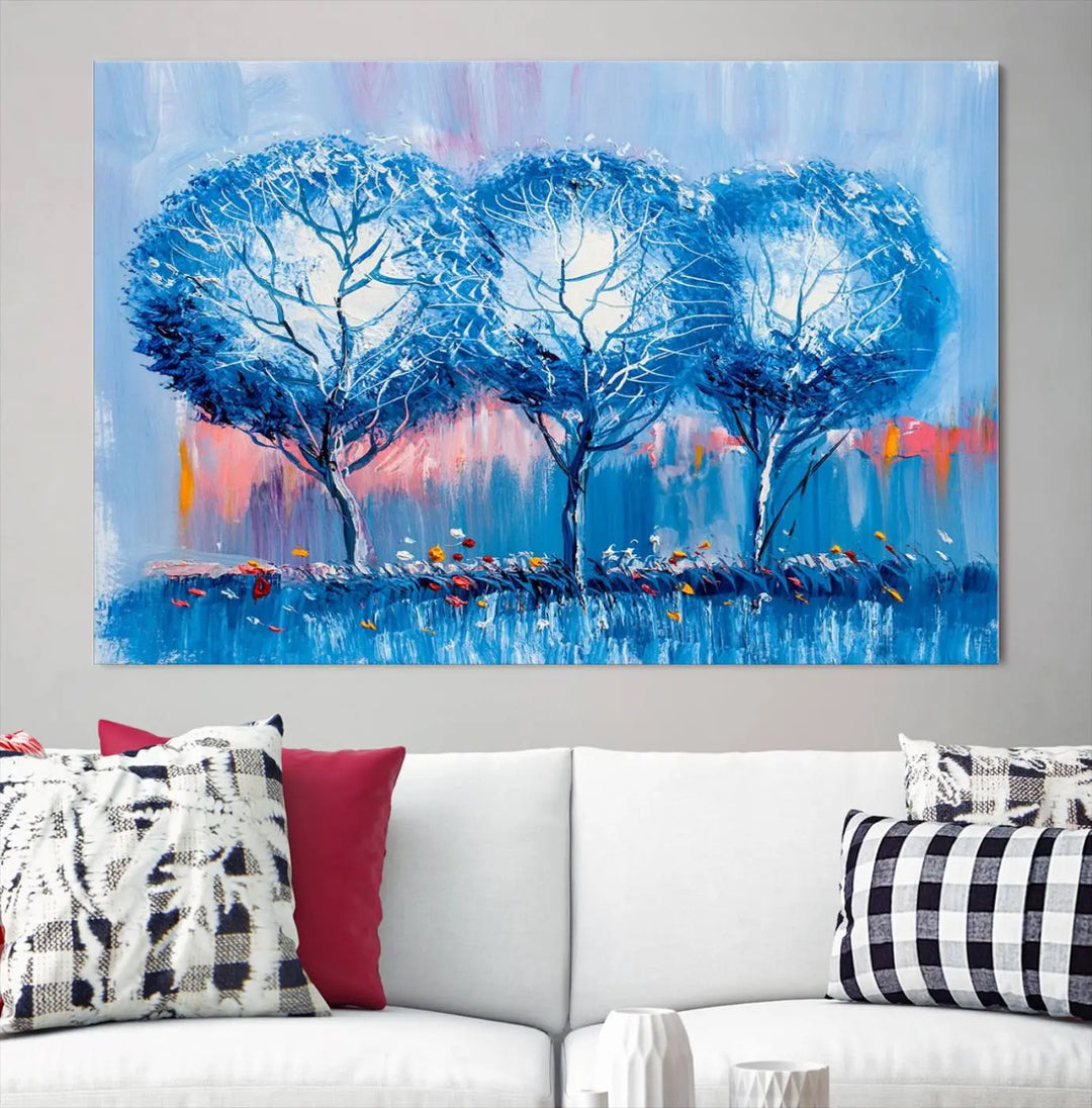 The living room showcases the Abstract Blue Trees Trendy Wall Art Canvas Print, elegantly featuring a triptych of blue trees against a pink background.