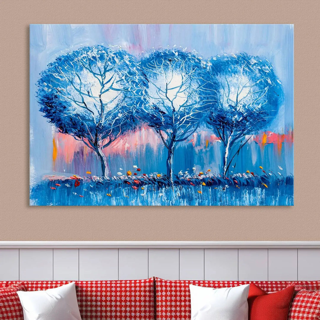 The living room showcases the Abstract Blue Trees Trendy Wall Art Canvas Print, elegantly featuring a triptych of blue trees against a pink background.