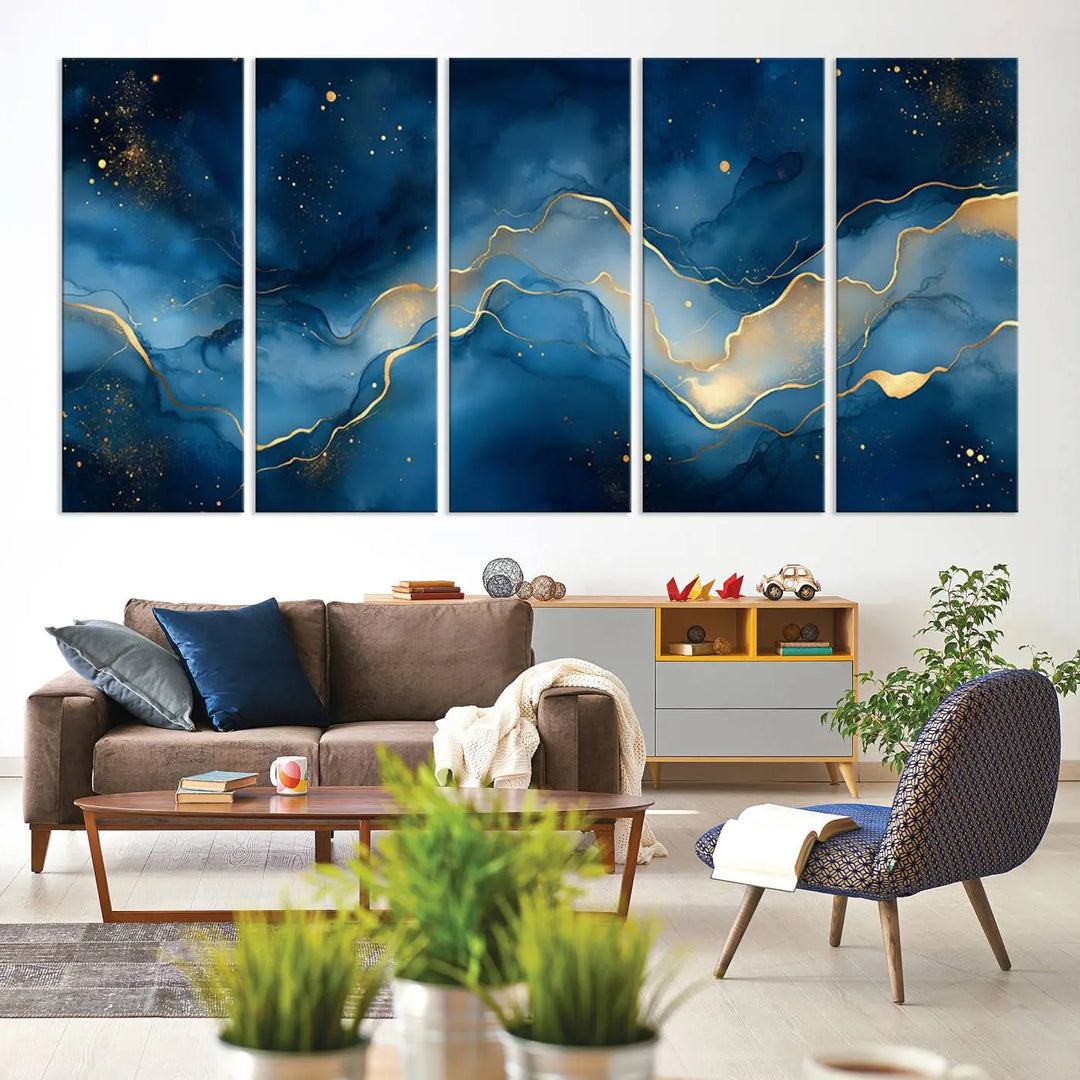 The gallery-quality Abstract Blue and Gold Canvas Wall Art hangs prominently on the wall.