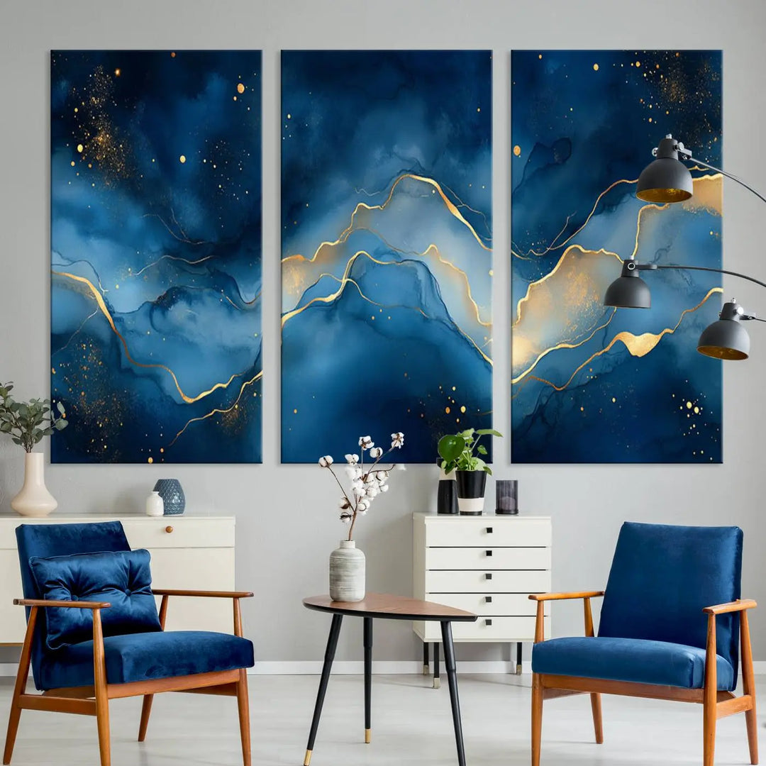 The gallery-quality Abstract Blue and Gold Canvas Wall Art hangs prominently on the wall.