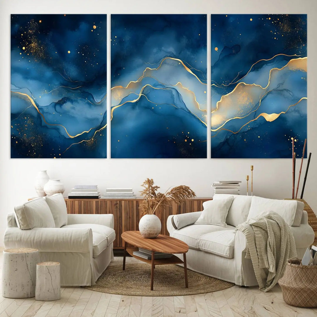 The gallery-quality Abstract Blue and Gold Canvas Wall Art hangs prominently on the wall.