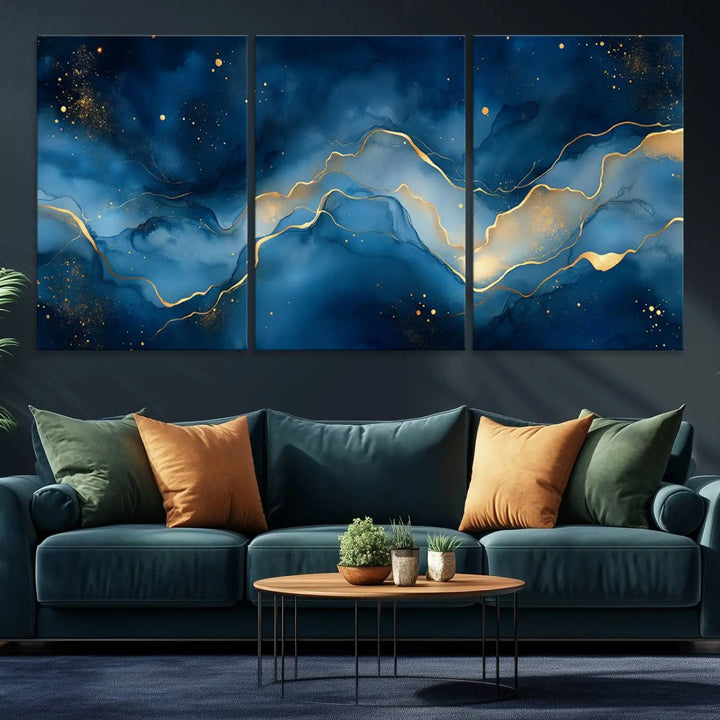 The gallery-quality Abstract Blue and Gold Canvas Wall Art hangs prominently on the wall.