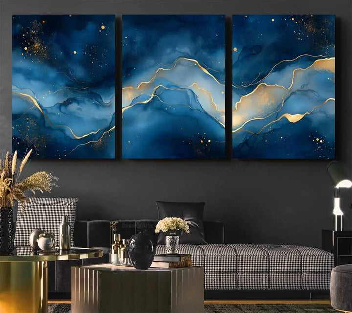 The gallery-quality Abstract Blue and Gold Canvas Wall Art hangs prominently on the wall.