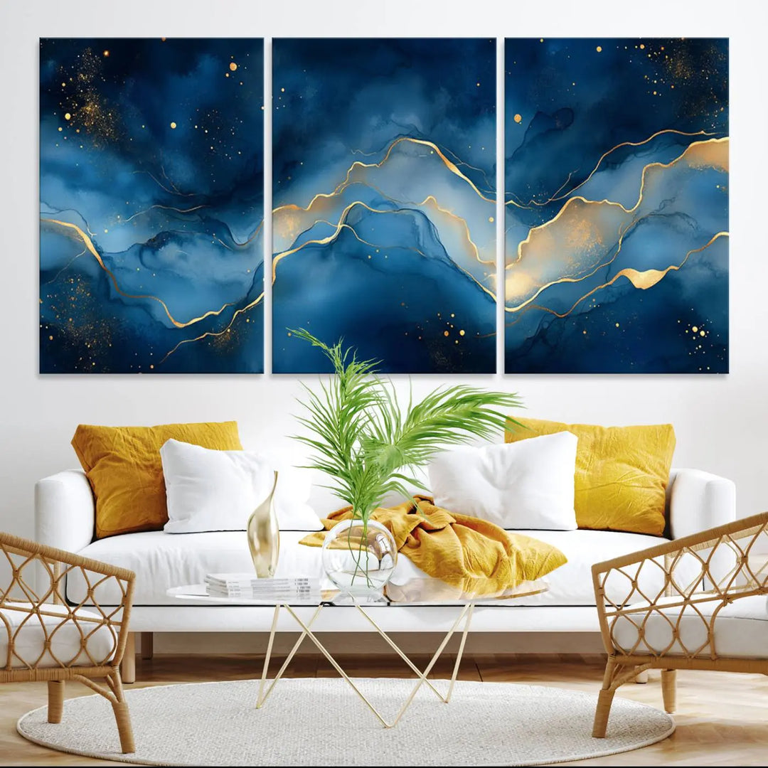 The gallery-quality Abstract Blue and Gold Canvas Wall Art hangs prominently on the wall.