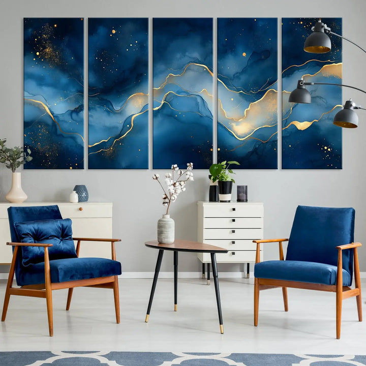 The gallery-quality Abstract Blue and Gold Canvas Wall Art hangs prominently on the wall.