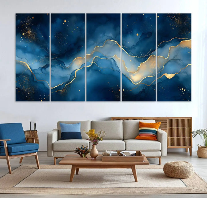 The gallery-quality Abstract Blue and Gold Canvas Wall Art hangs prominently on the wall.