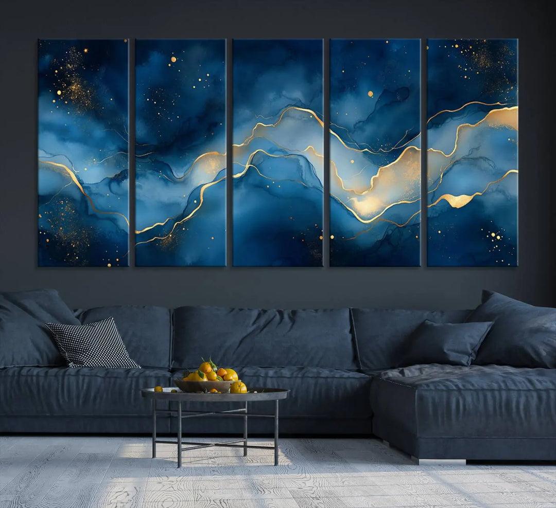 The gallery-quality Abstract Blue and Gold Canvas Wall Art hangs prominently on the wall.