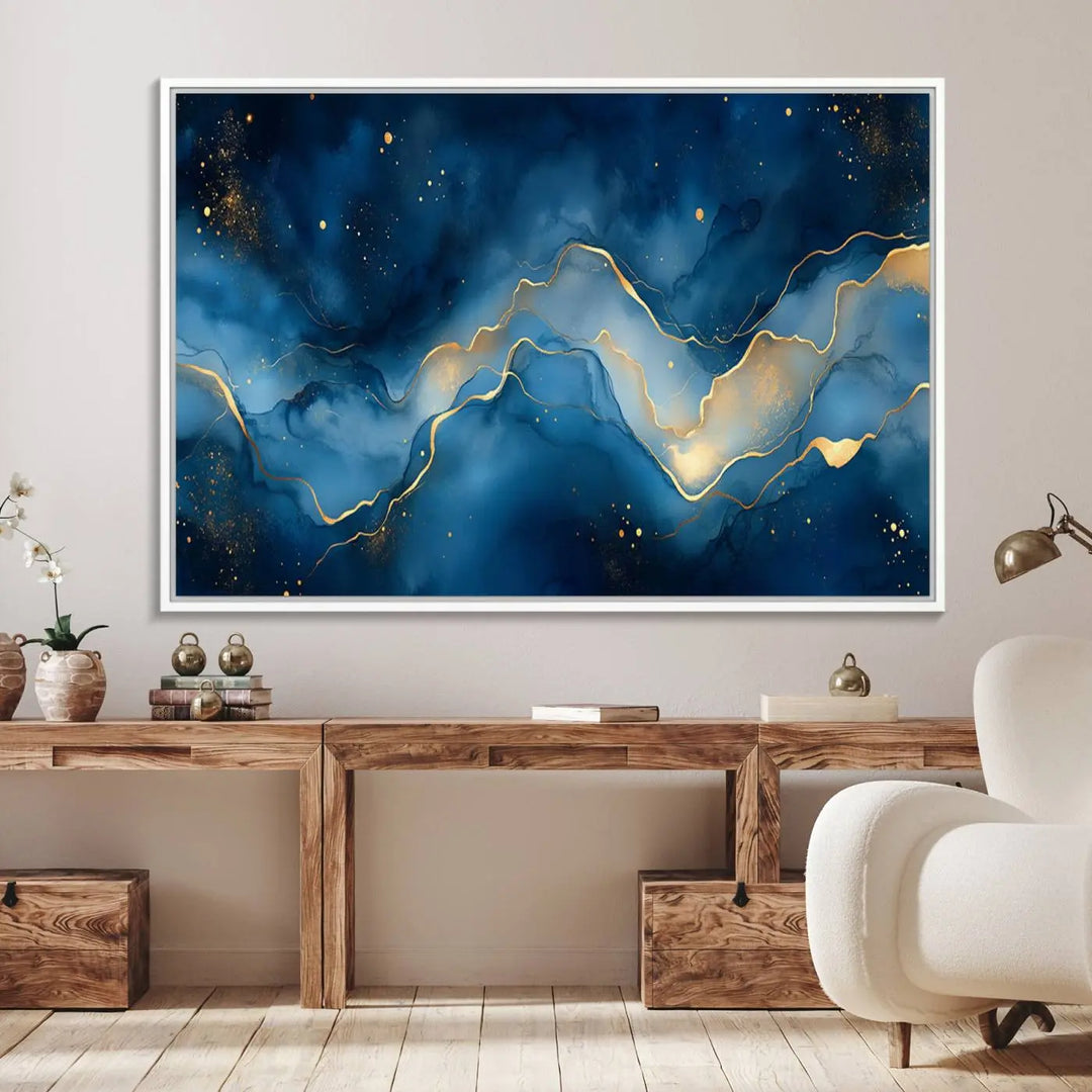 The gallery-quality Abstract Blue and Gold Canvas Wall Art hangs prominently on the wall.