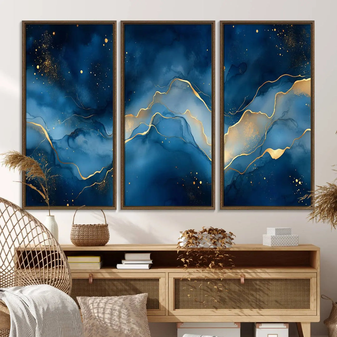 The gallery-quality Abstract Blue and Gold Canvas Wall Art hangs prominently on the wall.