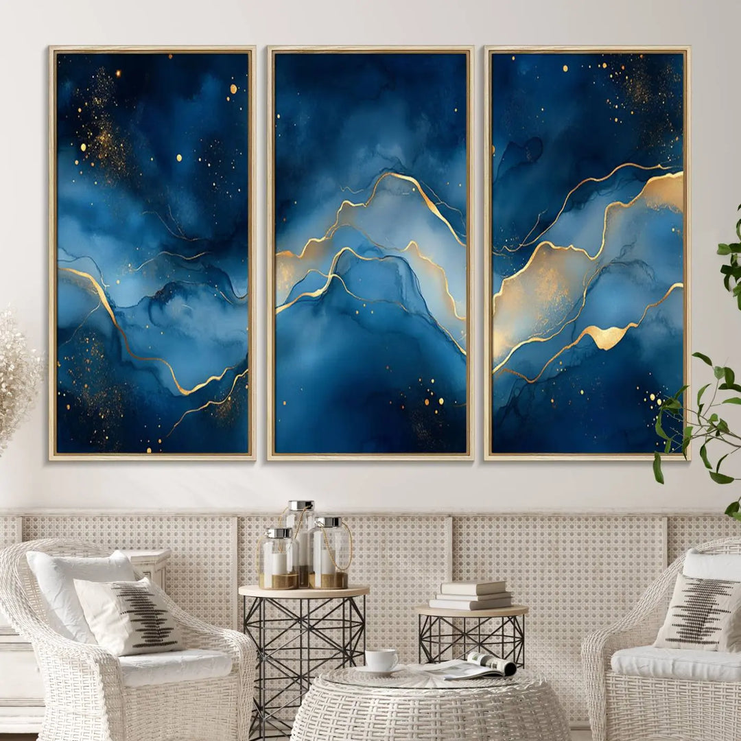 The gallery-quality Abstract Blue and Gold Canvas Wall Art hangs prominently on the wall.