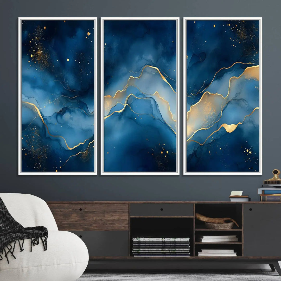 The gallery-quality Abstract Blue and Gold Canvas Wall Art hangs prominently on the wall.