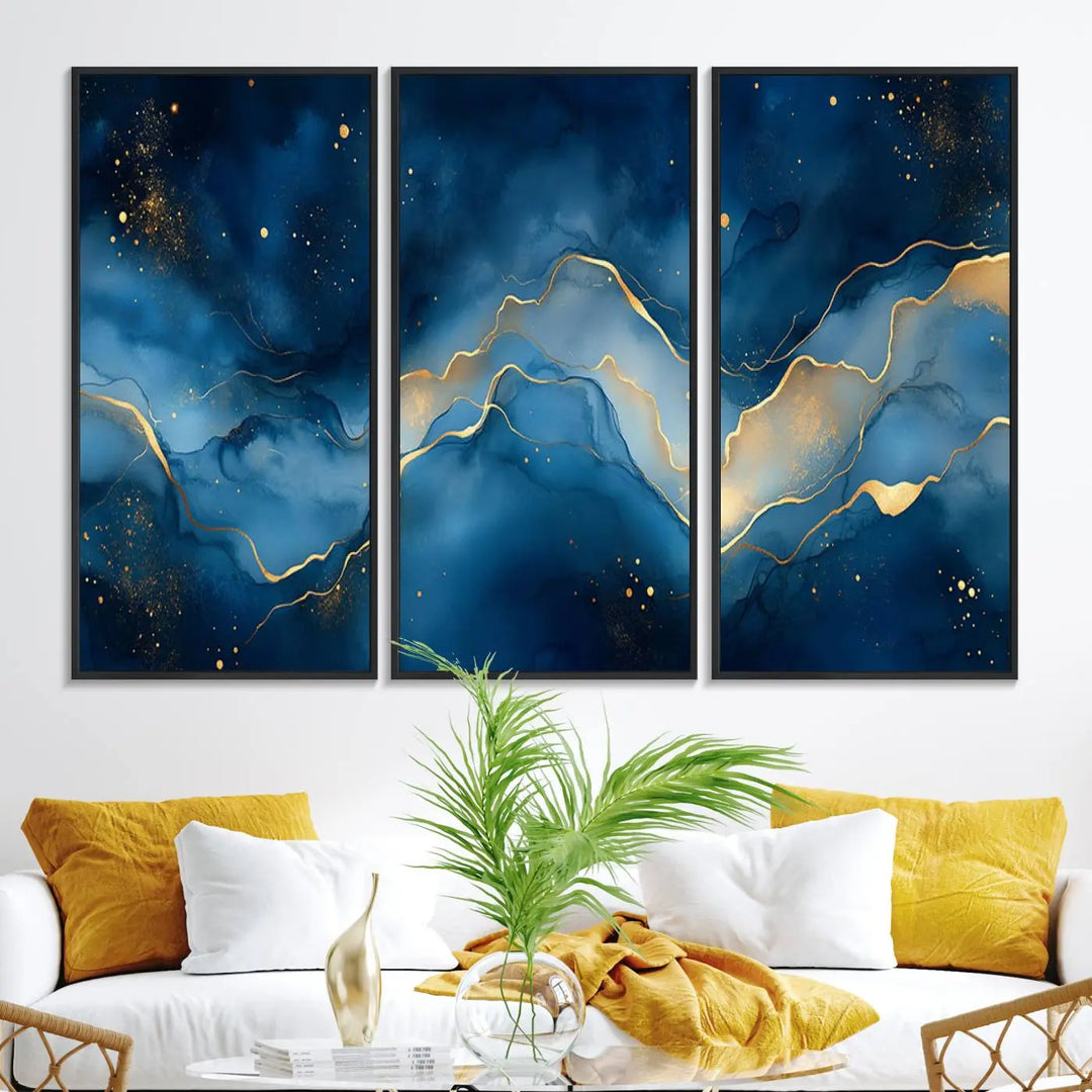 The gallery-quality Abstract Blue and Gold Canvas Wall Art hangs prominently on the wall.