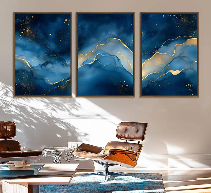 The gallery-quality Abstract Blue and Gold Canvas Wall Art hangs prominently on the wall.