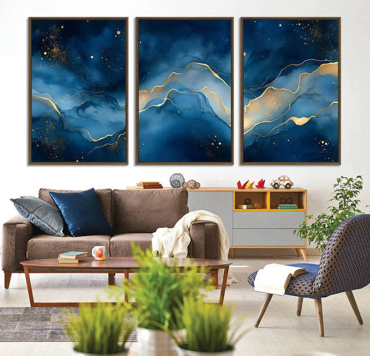 The gallery-quality Abstract Blue and Gold Canvas Wall Art hangs prominently on the wall.