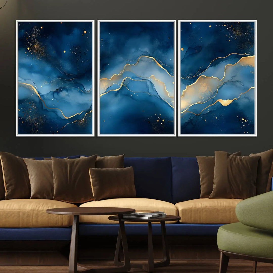 The gallery-quality Abstract Blue and Gold Canvas Wall Art hangs prominently on the wall.