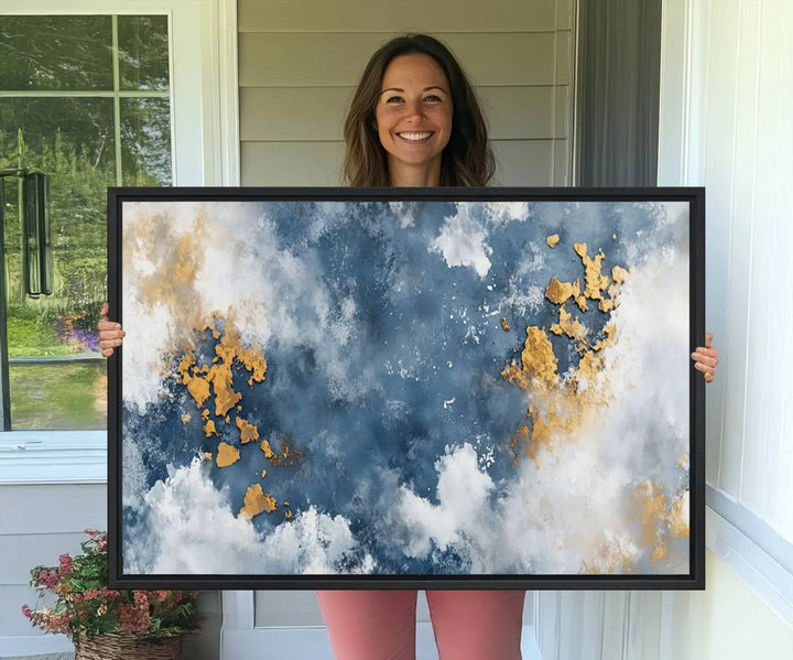 The modern kitchen showcases the Abstract Blue and Gold Cloud Canvas Wall Art.