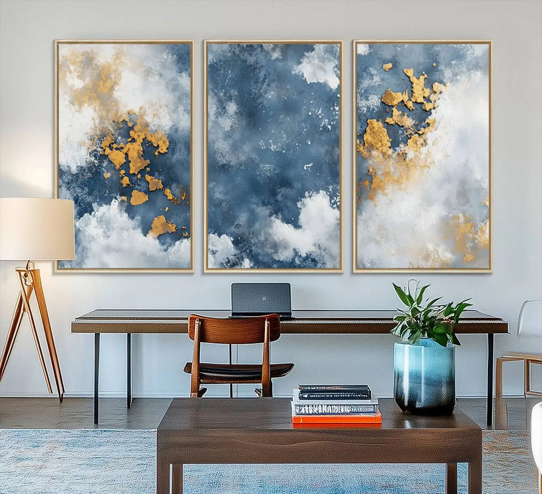 The modern kitchen showcases the Abstract Blue and Gold Cloud Canvas Wall Art.