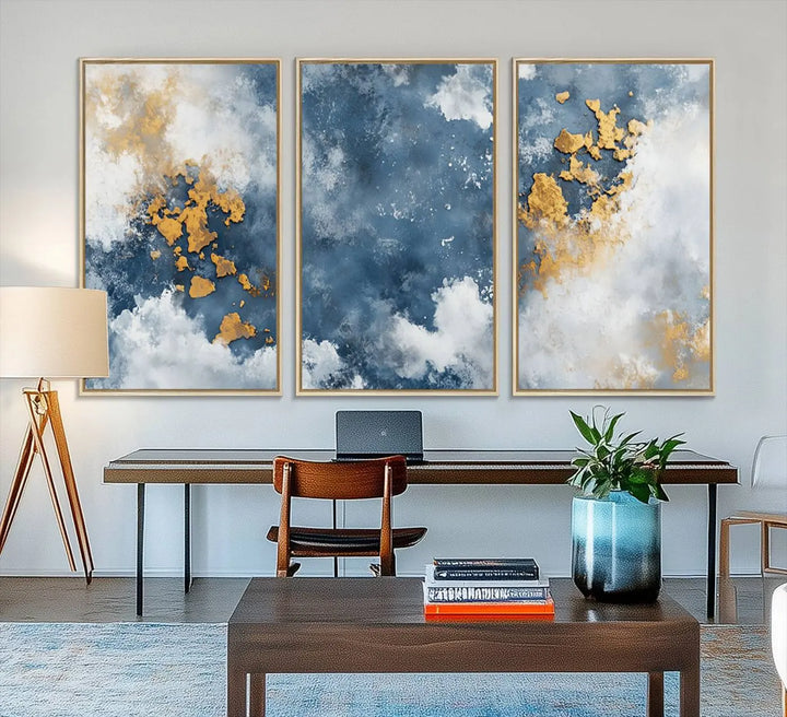 The modern kitchen showcases the Abstract Blue and Gold Cloud Canvas Wall Art.