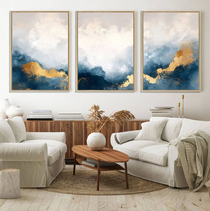 The Abstract Blue and Gold Clouds canvas art enhances the space.