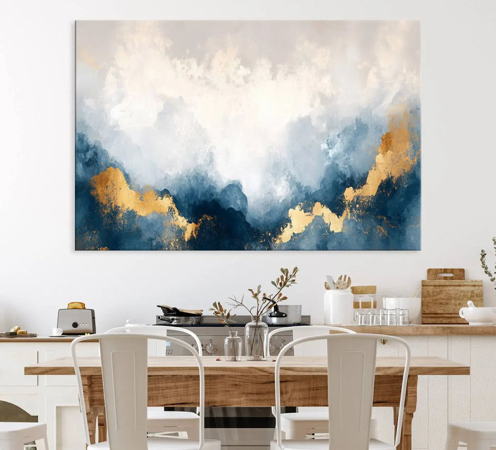 The Abstract Blue and Gold Clouds canvas art enhances the space.