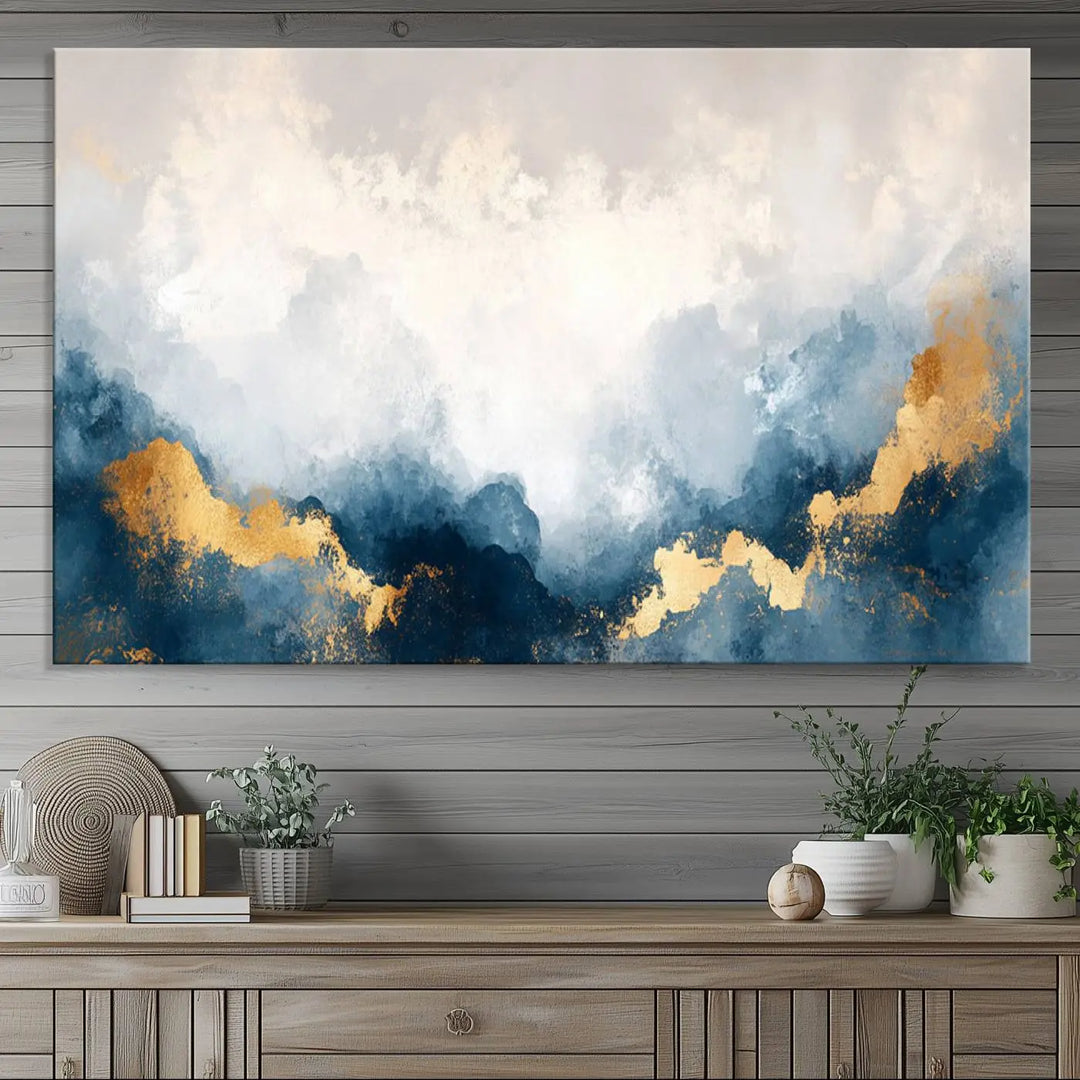 The Abstract Blue and Gold Clouds canvas art enhances the space.