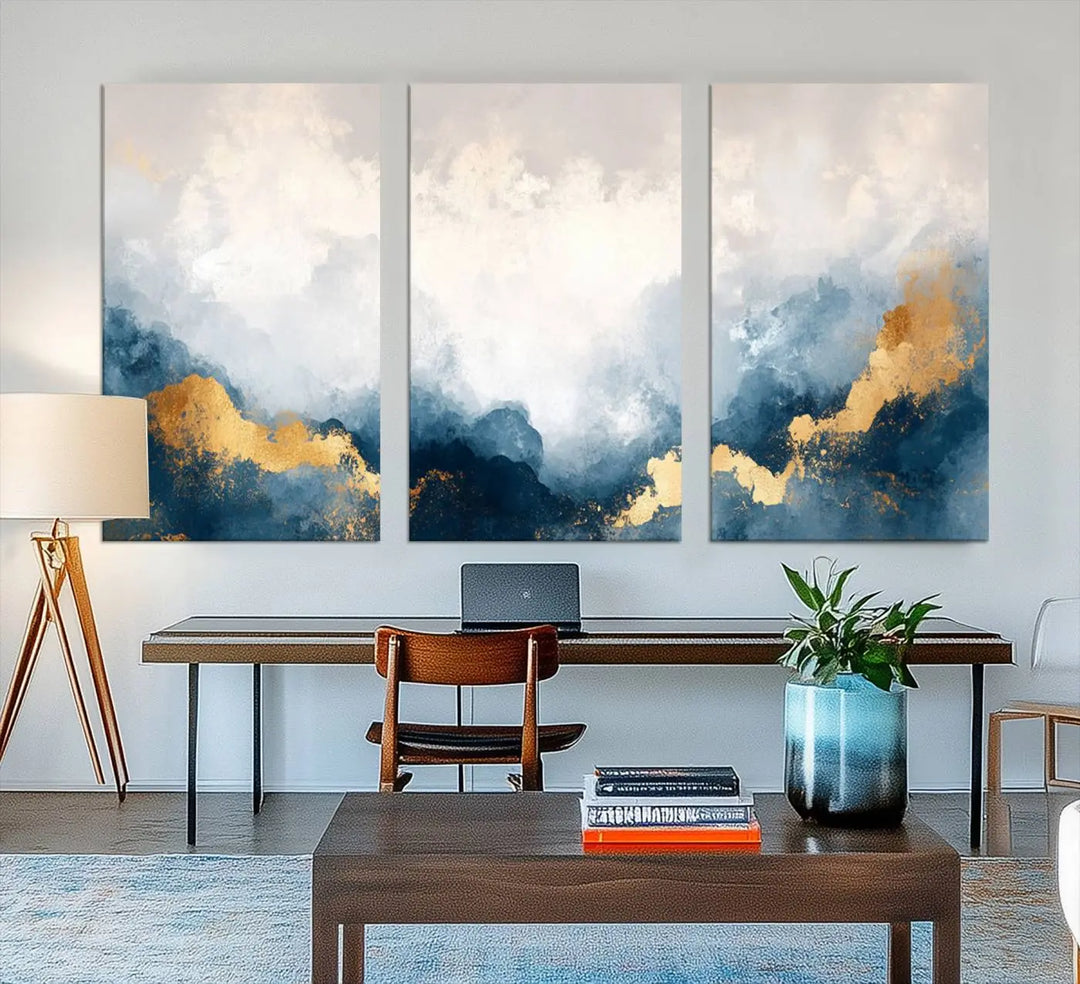 The Abstract Blue and Gold Clouds canvas art enhances the space.