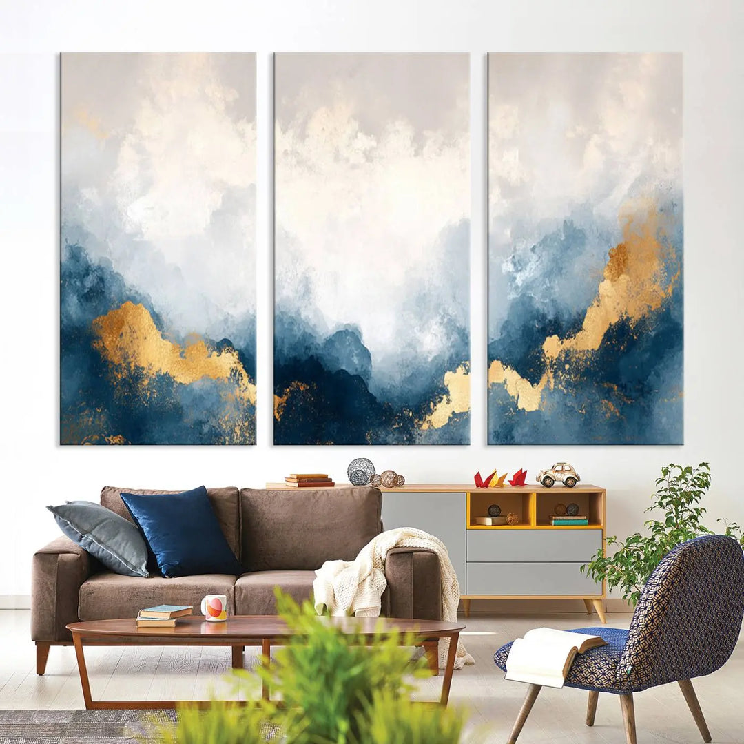 The Abstract Blue and Gold Clouds canvas art enhances the space.