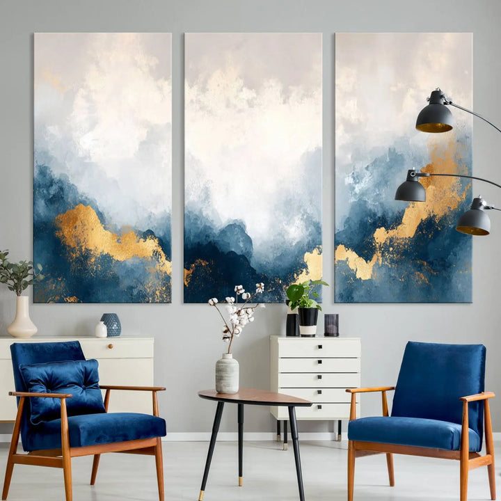 The Abstract Blue and Gold Clouds canvas art enhances the space.