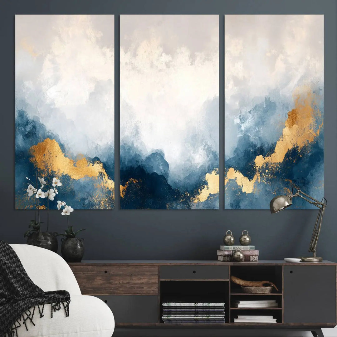 The Abstract Blue and Gold Clouds canvas art enhances the space.