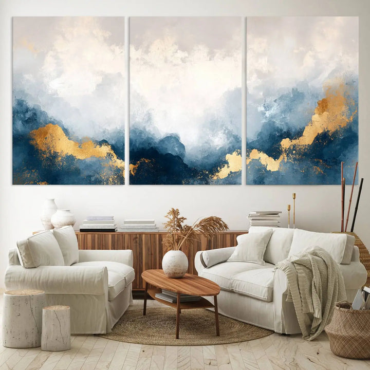 The Abstract Blue and Gold Clouds canvas art enhances the space.