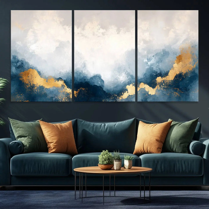 The Abstract Blue and Gold Clouds canvas art enhances the space.