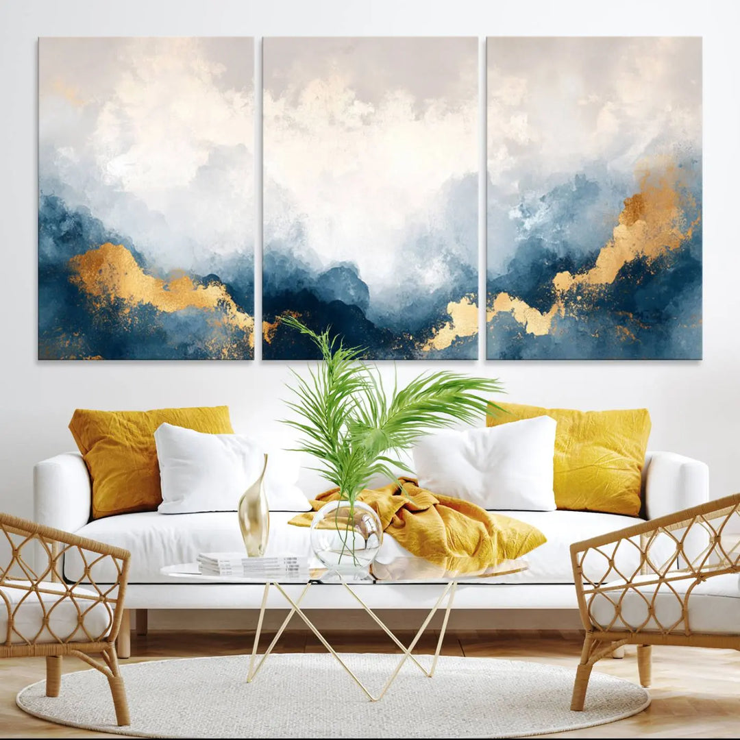 The Abstract Blue and Gold Clouds canvas art enhances the space.