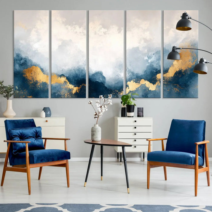 The Abstract Blue and Gold Clouds canvas art enhances the space.