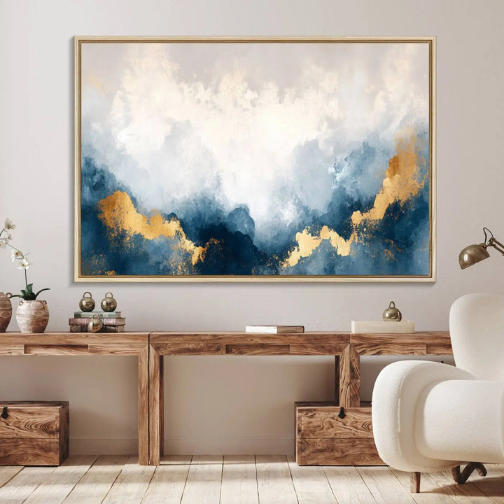 The Abstract Blue and Gold Clouds canvas art enhances the space.