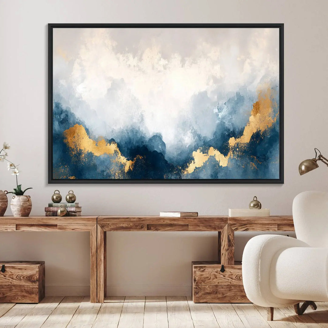 The Abstract Blue and Gold Clouds canvas art enhances the space.