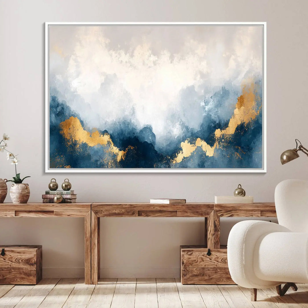 The Abstract Blue and Gold Clouds canvas art enhances the space.