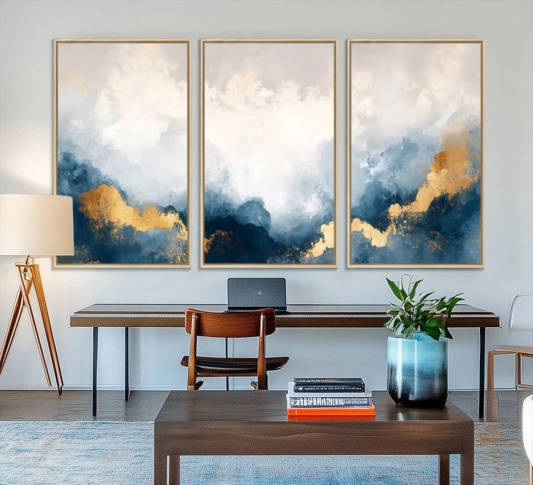 The Abstract Blue and Gold Clouds canvas art enhances the space.