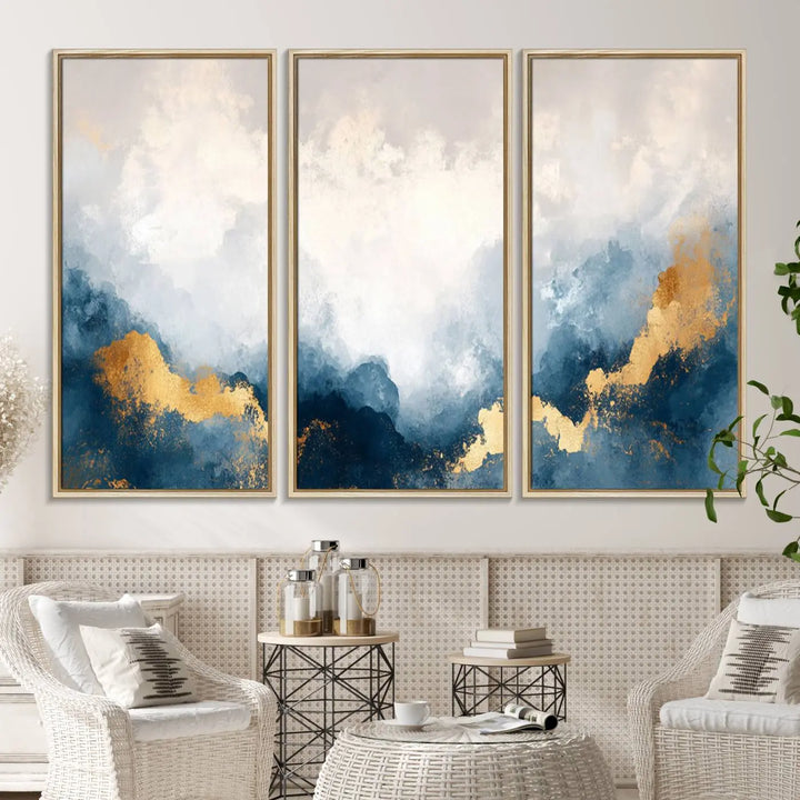 The Abstract Blue and Gold Clouds canvas art enhances the space.